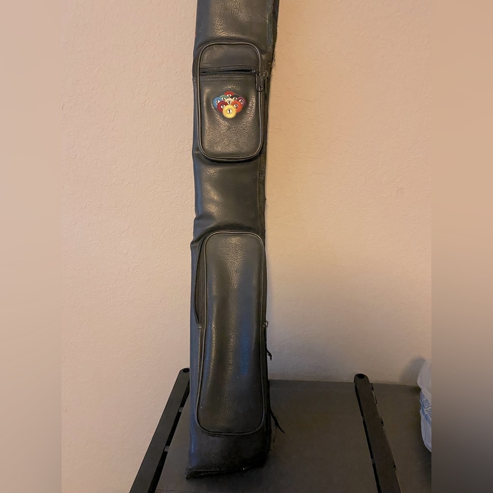2 “unidentified” pool cue stick carrying cases.
